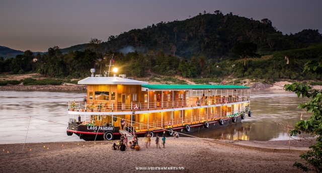  Mekong river cruises - Pandaw cruise - Anchor at a river bank in Laos at sunset time